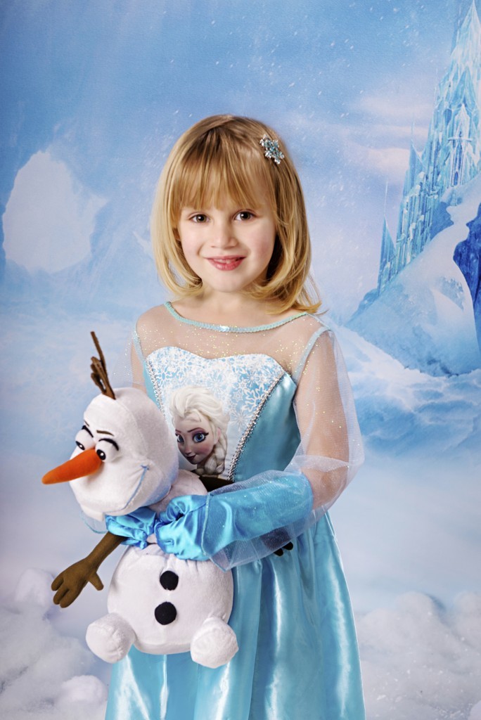 A little Elsa with Olaf the snowman