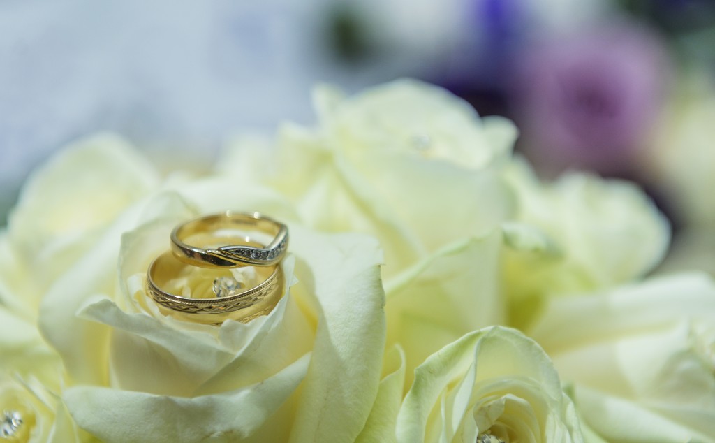 Wedding rings on a bouquet